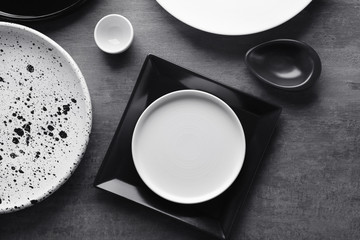 Canvas Print - Ceramic tableware on grey background