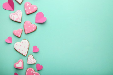 Homemade valentine cookies on mint background