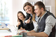 © Antonioguillem - Colleagues congratulating to a motivated worker at office
