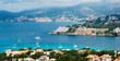 Beautiful panoramic view from above of Santa Ponsa resort, the beach with white sand, sunbeds, hotels and yachts, Mallorca