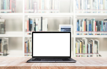 Wall Mural - Modern computer,laptop with blank screen on blur library,working space