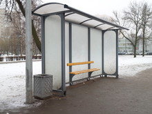 Stop Of A City Bus With A Bench On A Winter Day