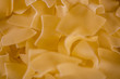 close up detail macro of square shape dry durum wheat  pasta 