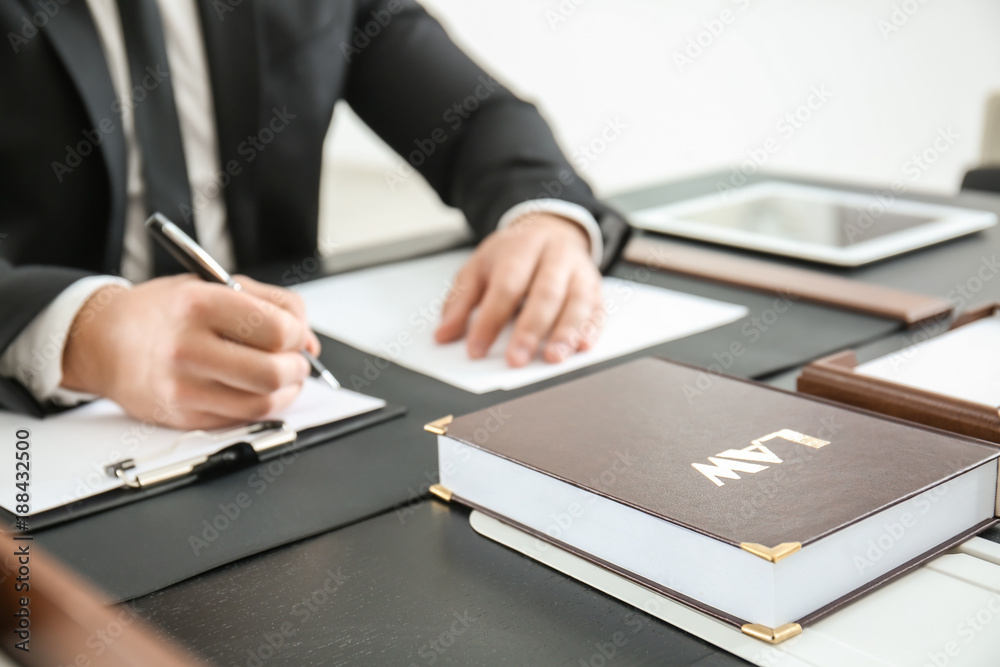 Young lawyer working in office, closeup