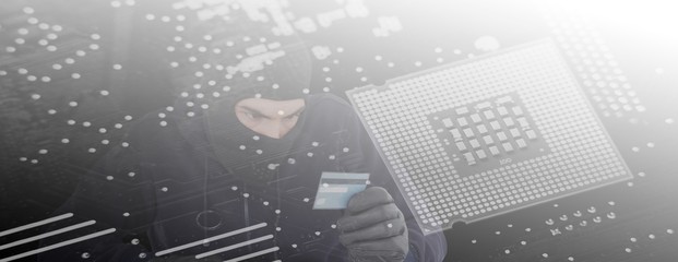 Poster - Composite image of focused burglar using computer and debit card