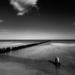 © dziewul - sunset over the sea with a wooden pier, black and white photo, long exposure