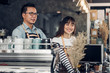 © weedezign - Asia Barista waiter smile and talking to customer in coffee shop,Two cafe owner at counter bar,Food and drink business concept,Service mind concept.