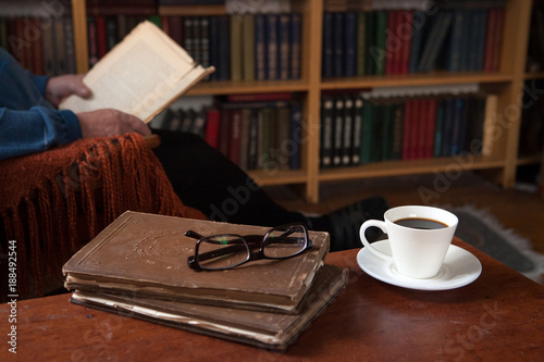 Sweet Moments Of Relaxation With Books And A Cup Of Coffee