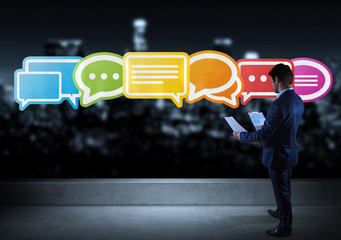 Wall Mural - businessman watching social network interface on a rooftop 3d rendering