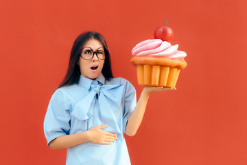 Woman Suffering Stomach Ache After Eating Too Much Cupcake 