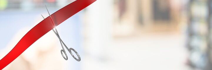 Poster - Scissors cutting ribbon with blurred background