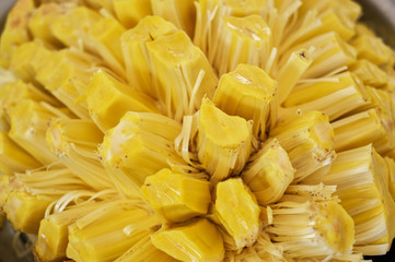 Fresh ripe jackfruit. Fresh sweet jackfruit segment ready for eat. Cutting jackfruit. Vegetarian, vegan, raw food.Tropical fruit. Selective focus.