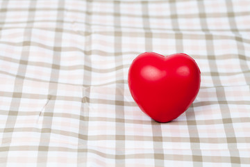 Wall Mural - Red heart sign on table cloth background ,Valentine