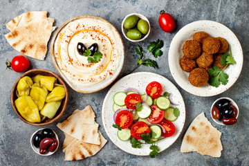 Middle Eastern traditional dinner. Authentic arab cuisine. Meze party food. Top view, flat lay, overhead