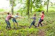 © oksix - Tug-of-war in park