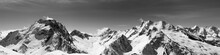Black And White Panoramic View Of Snow-capped Mountain Peaks