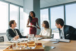 © Jacob Lund - Group of business people having meeting in conference room