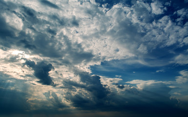 Wall Mural - stormy dark clouds and white clouds in the dark sky