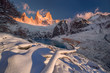 Winter panorama of mountain Fitz Roy, trees and rocks covered with fresh snow. Los Glaciares National Park, Patagonia, Argentina