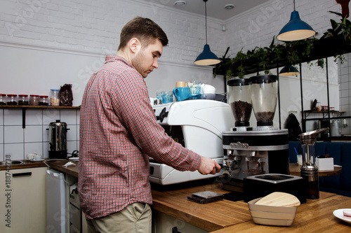 Young Handsome Barista Hipster Making Coffee Cafe Man Machine Grains Hot Steam Milk Shirt Cage Espresso Young Handsome Barista Hipster Making Coffee Cafe Man Machine Grains Hot Steam Milk Shirt Cage Espresso
