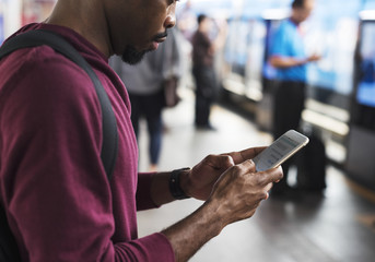 African man using mobile phone