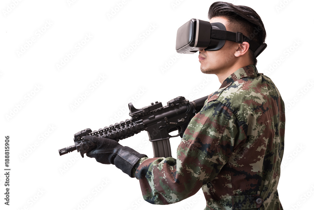 Fotografie The isolated image of the soldier use a VR glasses for ...