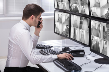 Aufkleber - Security Guard Monitoring CCTV Footage