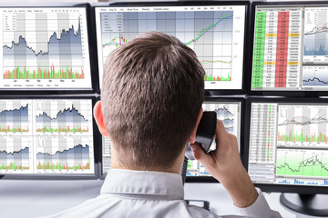 Aufkleber - Close-up Of Stock Broker Talking On Telephone