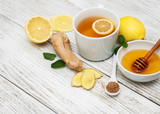 Fototapeta Kuchnia - Cup of tea with lemon and ginger