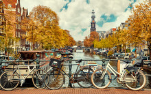 Bike Over Canal Amsterdam City. Picturesque Town Landscape