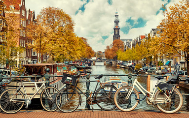 bike over canal amsterdam city. picturesque town landscape