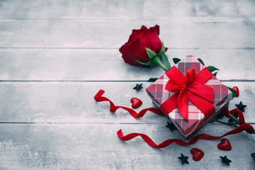 Canvas Print - Valentine background with red rose flower and small present box on rustic wood. Happy lovers day gift mockup, copy space