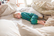 © Suzanne - Toddler Sleeping In Parent's Bed