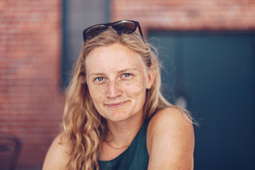 Blonde Woman with Freckles at a Coffee Shop