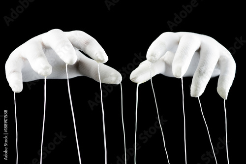 Fotomural Control concept, gloved hands with cord