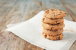 Delicious oatmeal cookies with chocolate chips on wooden table
