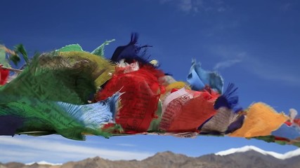 Wall Mural - Plenty of colorful Buddhist prayer flags at temple in the Shanti Stupa. Leh, Ladakh, India