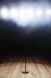 © nagaets - Live music background.Microphone and stage lights.Sing and karaoke
