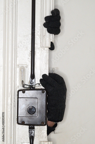 Photo  Housebreaker opening door