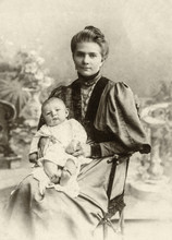 Vintage Photo Of The Russian Woman With The Small Child On Hands, The Beginning Of The 20th Century