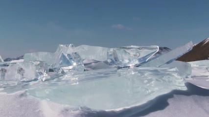 Wall Mural - Winter Baikal. Ice against clear sky and sun