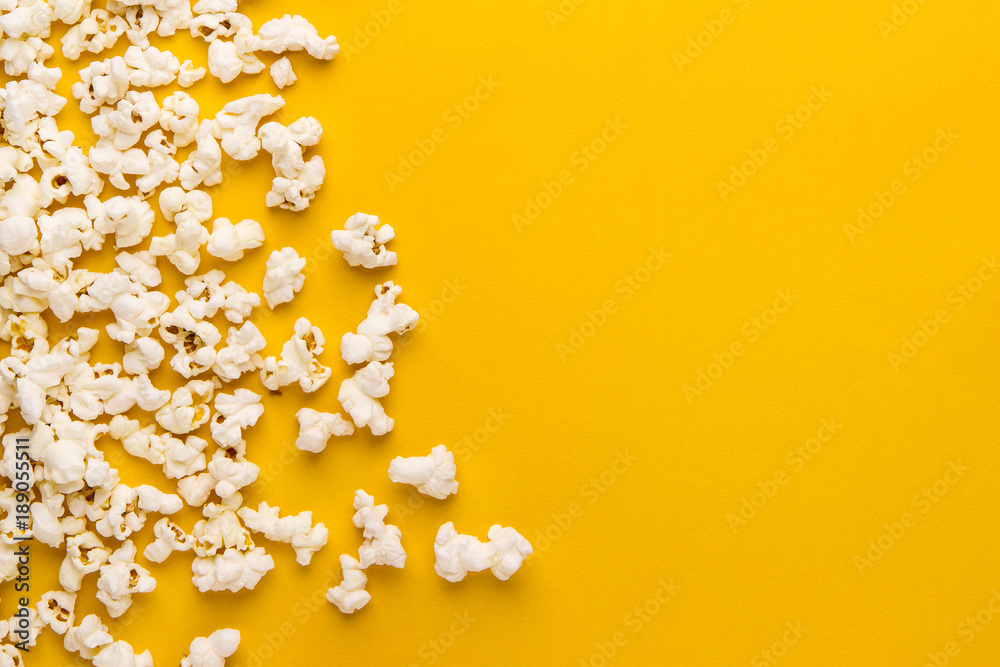 popcorn on a yellow - obrazy, fototapety, plakaty 