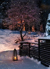 Lanterns In Christmas Snowfall Garden