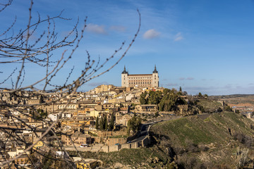 Wall Mural - The alcazar dominating the city of Toledo. Spain