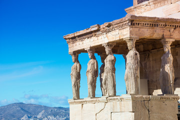 Fototapete - Karyatides statues, Erehtheio, on the Acropolis in Athens, Greece