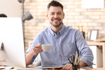 Canvas Print - Young stock exchange trader working in office