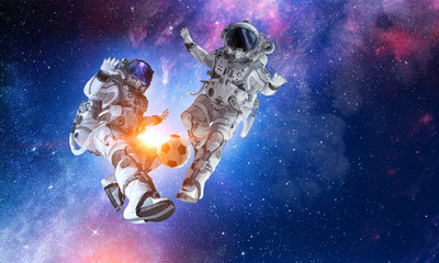Wall Mural - astronaut play soccer game