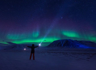 Wall Mural - the polar arctic northern lights aurora borealis sky star in norway svalbard in longyearbyen city ma