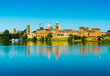 Mantova, Italy: Cityscape reflected in water. Old Italian town skyline. Province of Lombardy.