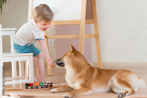 2 Years Old Child Playing With Building Blocks At Home